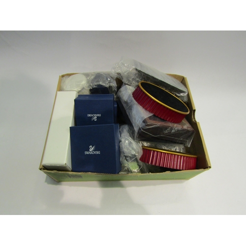 4511 - A selection of small Swarovski ornaments and a box of stands