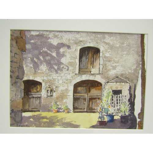 4521 - STAN DANIELS (Suffolk Artist) A framed and glazed watercolour, Suffolk Houses, signed. Image size 25... 