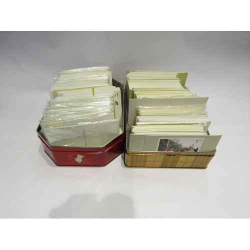 4559 - Two tins of loose post card stamps