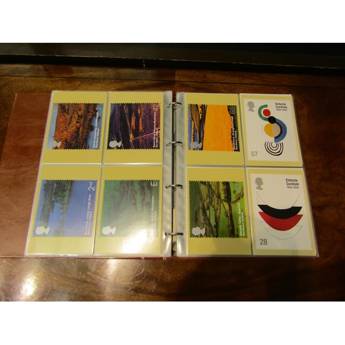 4560 - Four albums of Royal Mail postcards, one 1985-88 and three 2001-2003   (E) £20-30