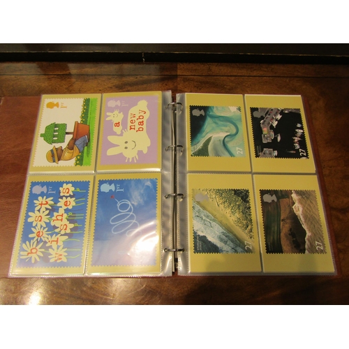 4560 - Four albums of Royal Mail postcards, one 1985-88 and three 2001-2003   (E) £20-30