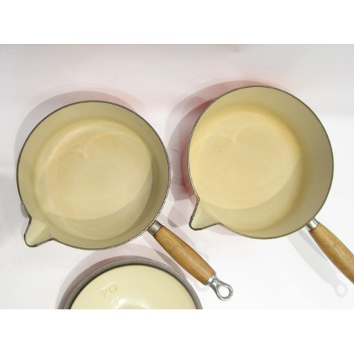 4161 - Two Le Creuset pans ; no20 (with lid) and no22  (R)  £30