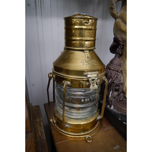 2243 - A brass ship lamp   (R) £50