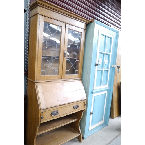 2441 - An Edwardian inlaid oak bureau bookcase    (E) £10-20