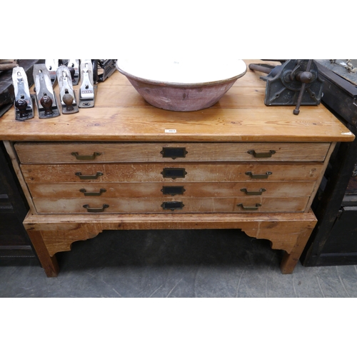 2011 - A pine plan chest of four drawers on stand 128w x 91d x 83cm tall