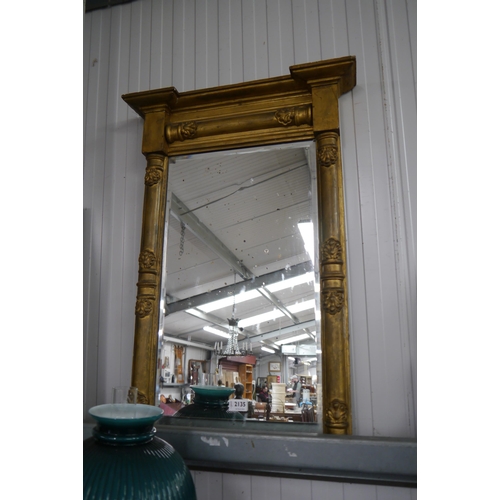 2135 - A 19th Century gilt and gesso framed pier mirrror, back missing to base