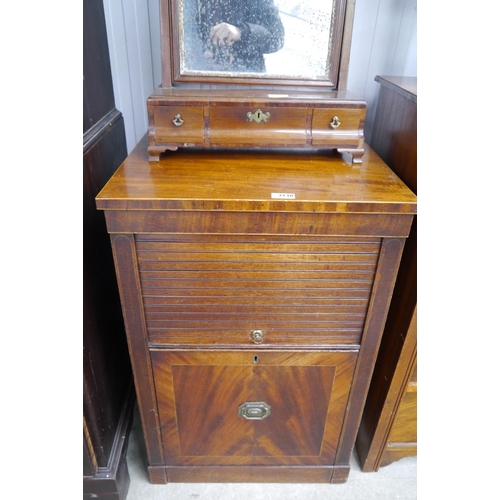 2138 - A 19th Century mahogany tambor fall night stand with cupboard base