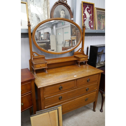 2150 - An oak Edwardian dressing table oval bevel mirror two Jewellery drawers two over three drawer base  ... 