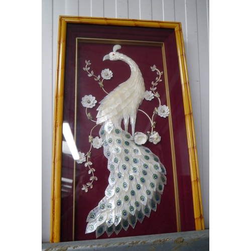 2155 - A pair of peacock wall hangings made from shells