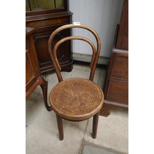 2159 - A child's bentwood mundus and J&J Kohn Ltd chair, paper label to underside