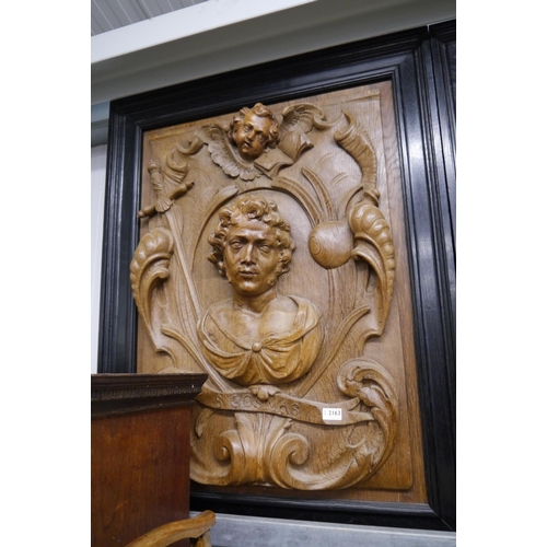 2163 - An 18th Century carved oak panel of St Comas in black frame 85 x 108cm   (R) £700