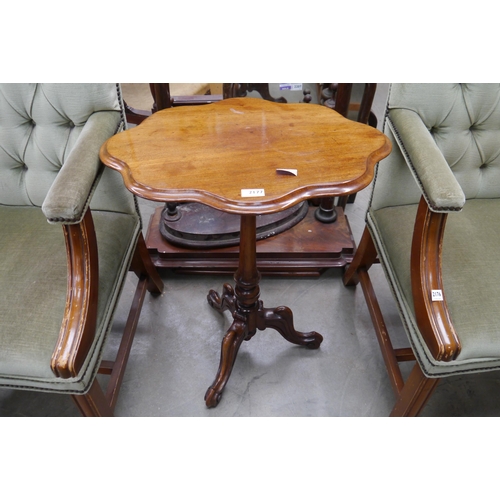 2177 - A Victorian walnut occasional tripod table with shaped top