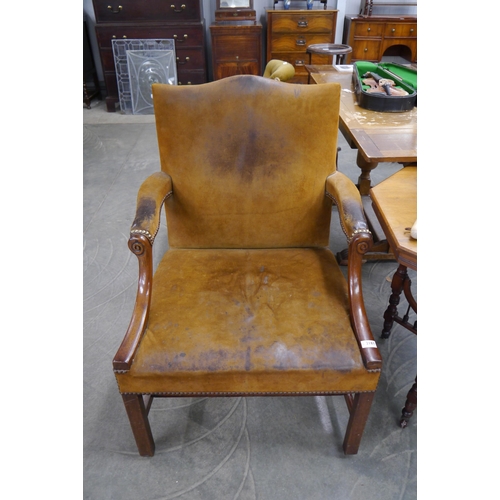 2181 - A 19th Century mahogany leather desk elbow chair