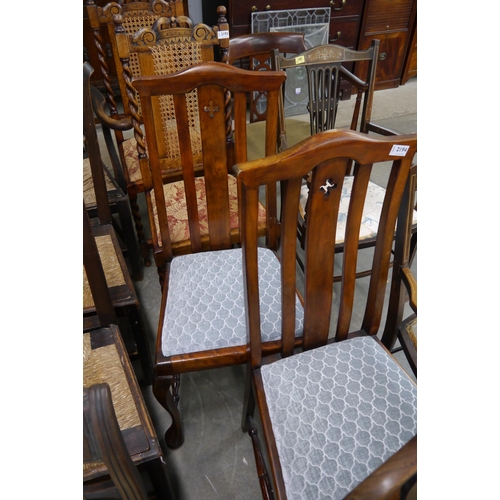 2194 - A pair of Edwardian chair carved motif to back splat drop-in seats