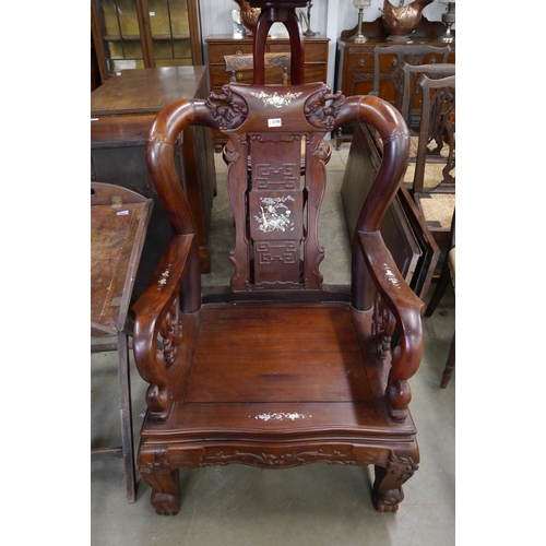 2198 - A pair of substantial hardwood armchairs with mother-of-pearl inlay   (R) £500