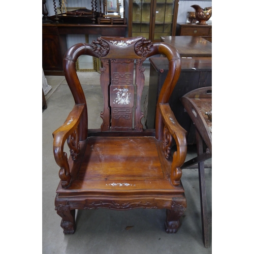 2198 - A pair of substantial hardwood armchairs with mother-of-pearl inlay   (R) £500