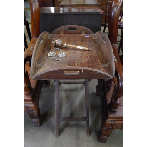 2199 - A mahogany butlers tray on folding stand