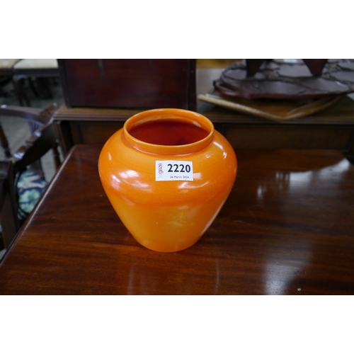 2220 - An orange vase