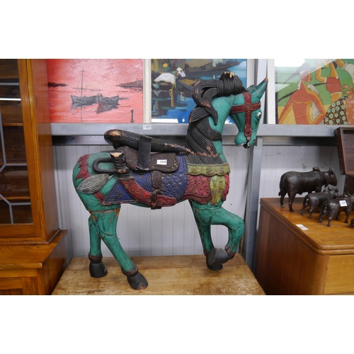 2238 - A carved and painted timber Indian horse