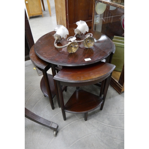 2256 - A 1940's quatrefoil nest of tables