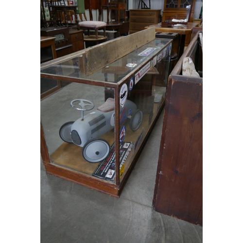 2258 - A large oak display unit   (E) £30-50