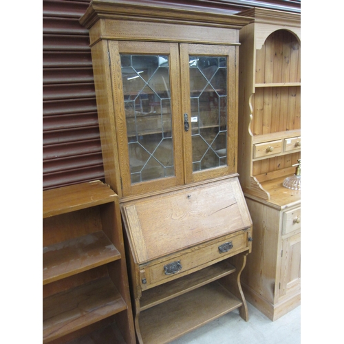 2441 - An Edwardian inlaid oak bureau bookcase    (E) £10-20