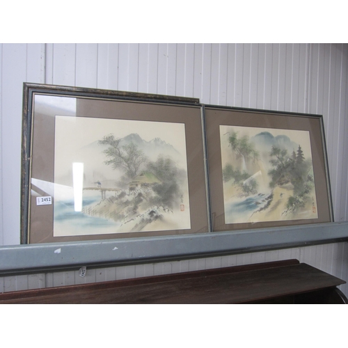 2452 - Three 20th Century Oriental paintings on silk of mountainous landscapes