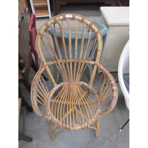 2477 - A 1960's wicker chair and box of pots