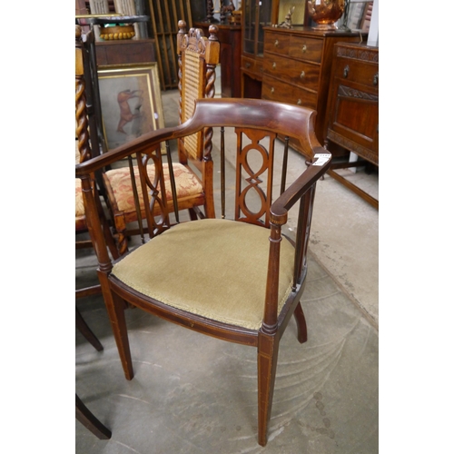 2192 - An Edwardian style mahogany chair, pierced back, on square tapering legs