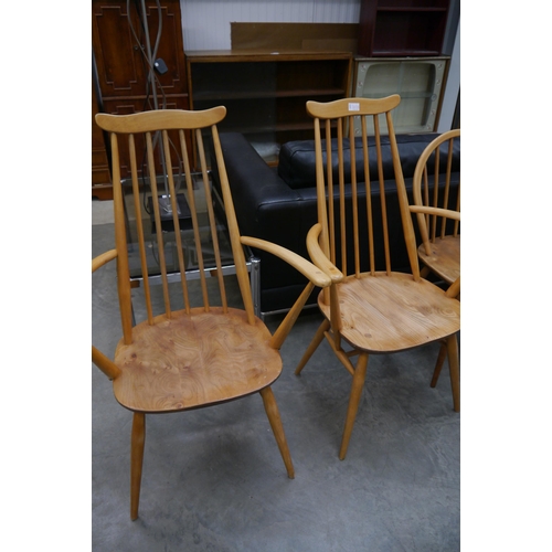 2467A - A pair or Ercol elbow chairs