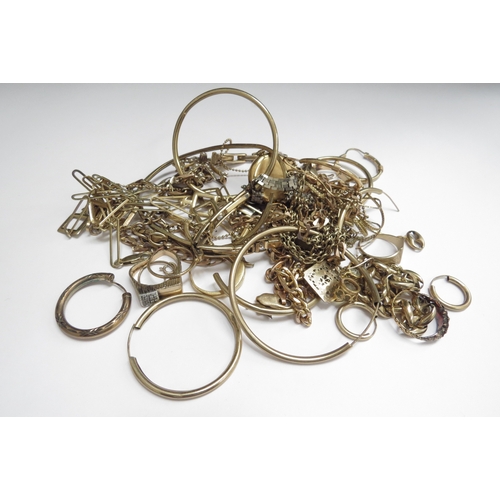 7409 - A bag of gold scrap items all a/f necklaces, bracelets, brooch, stone set rings etc and a gold cased... 