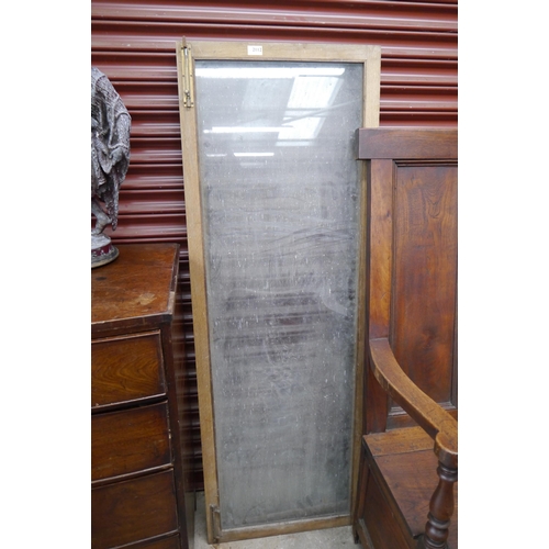 3502 - A pair of glazed cupboard doors, 159cm x 55cm