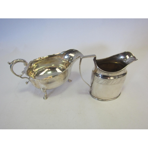 1347 - A silver sauce boat, Sheffield and a bright cut silver jug, London, monogrammed (2)