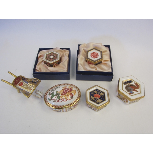 1358 - A collection of Royal Crown Derby pill boxes (mainly Imari pattern) and a wheelbarrow