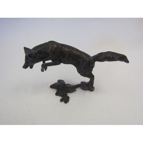 1367 - A bronze sculpture of leaping fox, 8.5cm high