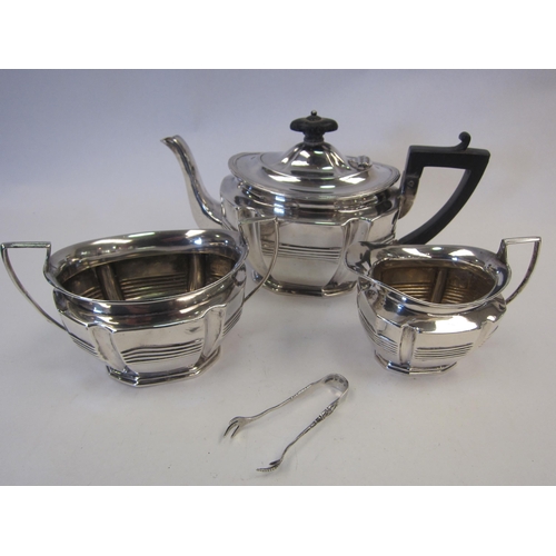 1368 - A silver bachelor teapot, matching jug and sucrier and associated silver nips, London