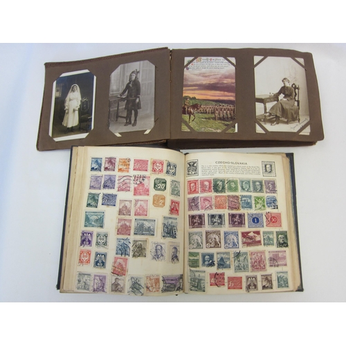 1373 - A stamp album containing early 20th Century stamps to include Danish West Indies, China, French Colo... 