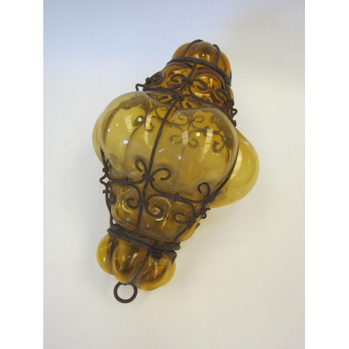 1405 - An amber glass light shade, 27cm deep