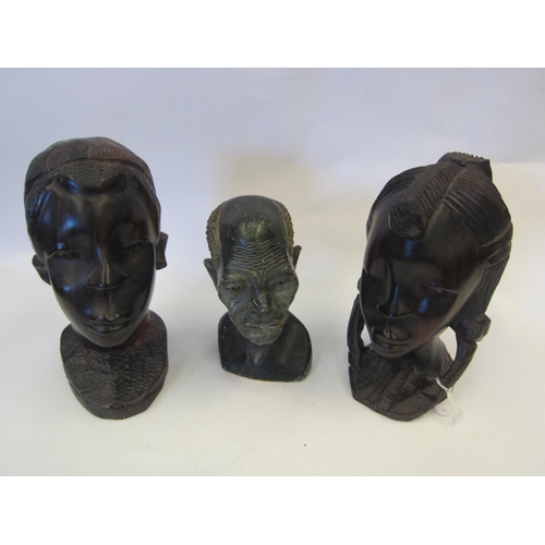 1413 - Two African carved wooden busts and a soapstone example, tallest 19cm    (E)  £15-20