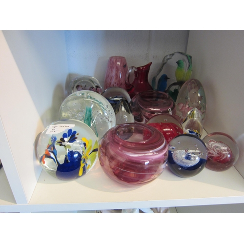 1425 - A large collection of glass paperweights and bowls including Mdina