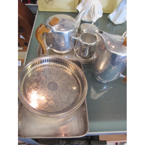 1514 - A Piquot ware tea and coffee set and three plated trays     (E) £15-20