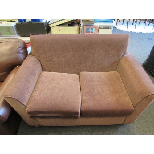 1144 - A small modern cottage two seater sofa in brown upholstery, 87cm x 137cm x 84cm