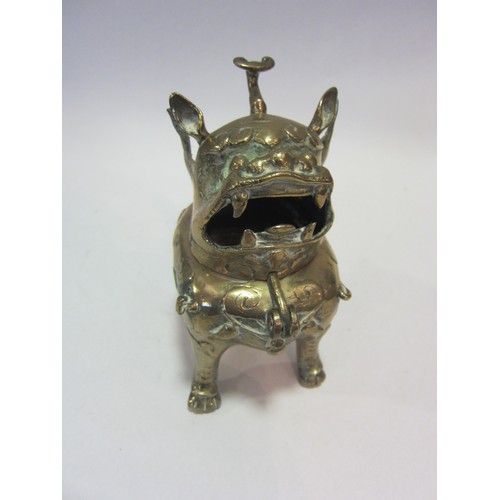 1356 - An Oriental brass Quilin style censer, 16cm high