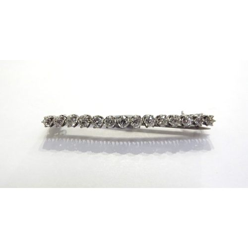 7393 - An Edwardian diamond bar brooch, fourteen old mine cut diamonds, 1.12ct total approx, in white gold ... 