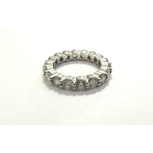 7397 - A diamond full eternity ring, 18 x 0.18ct approx diamonds, unmarked white gold. Size O/P, 6.2g  - RE... 