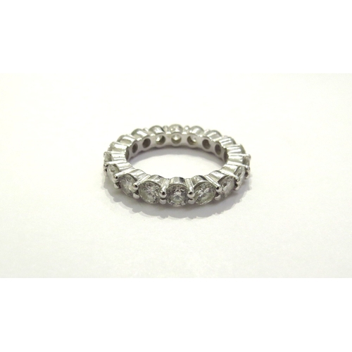 7397 - A diamond full eternity ring, 18 x 0.18ct approx diamonds, unmarked white gold. Size O/P, 6.2g  - RE... 