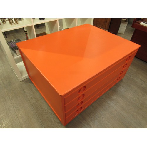 2278 - An orange painted four drawer Plan chest in Beech ply, with inset handles and set of four castors. 1... 