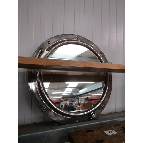 2244 - A chrome porthole window mirror