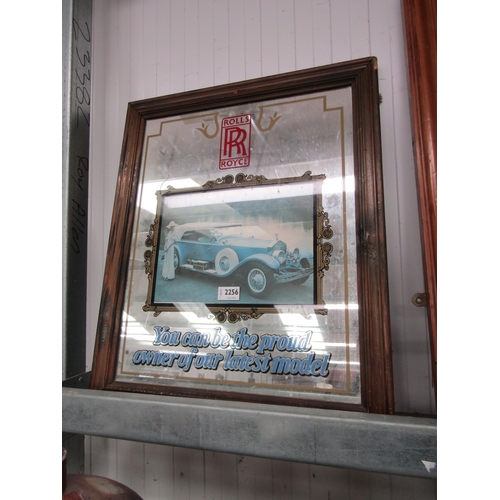 2256 - A wooden framed Rolls Royce advertising mirror 