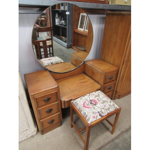 2258 - A 1940's Deco walnut bedroom set of wardrobe, dressing table and an oak stool